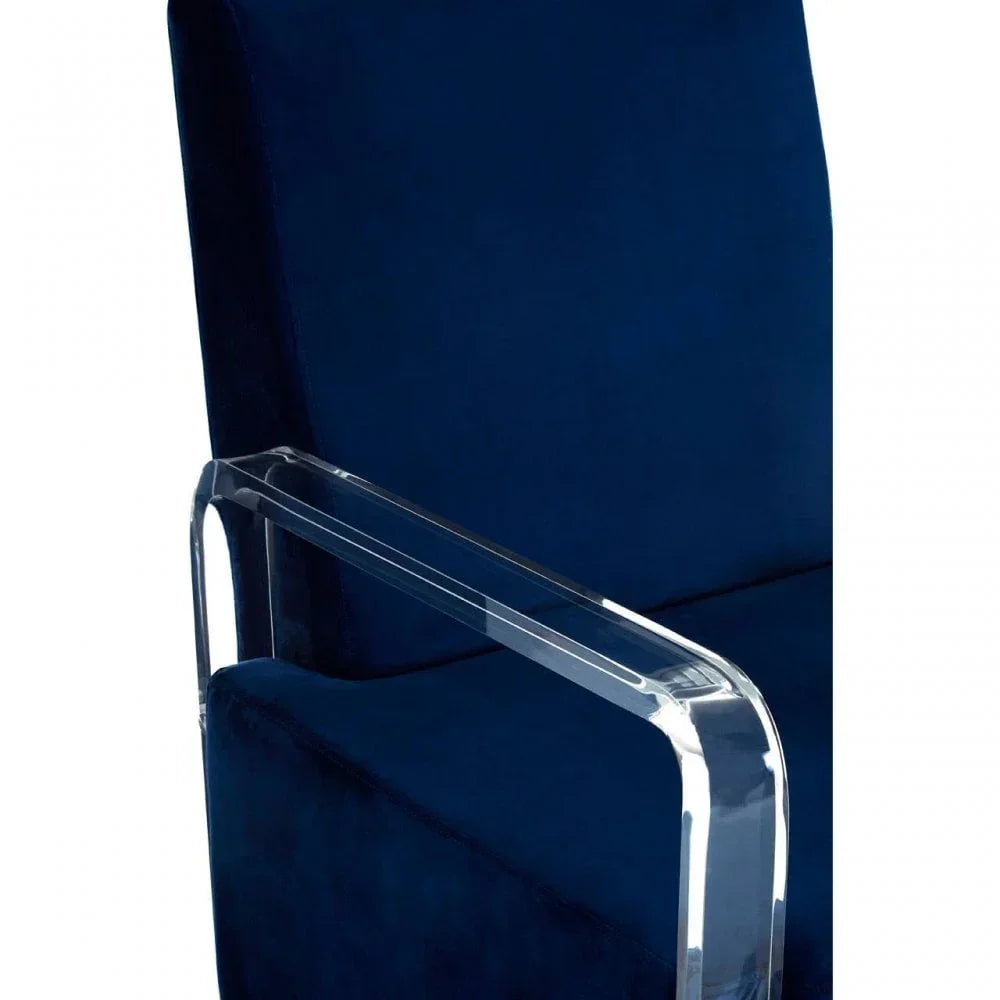 Navy blue velvet armchair with clear acrylic armrest closeup