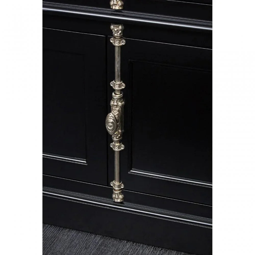 Black sideboard cabinet with ornate silver handle and panelled drawer detail