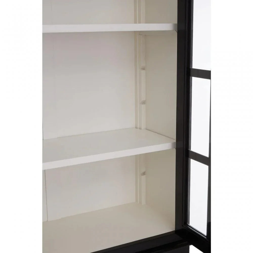 White shelving inside black frame glass display cabinet closeup