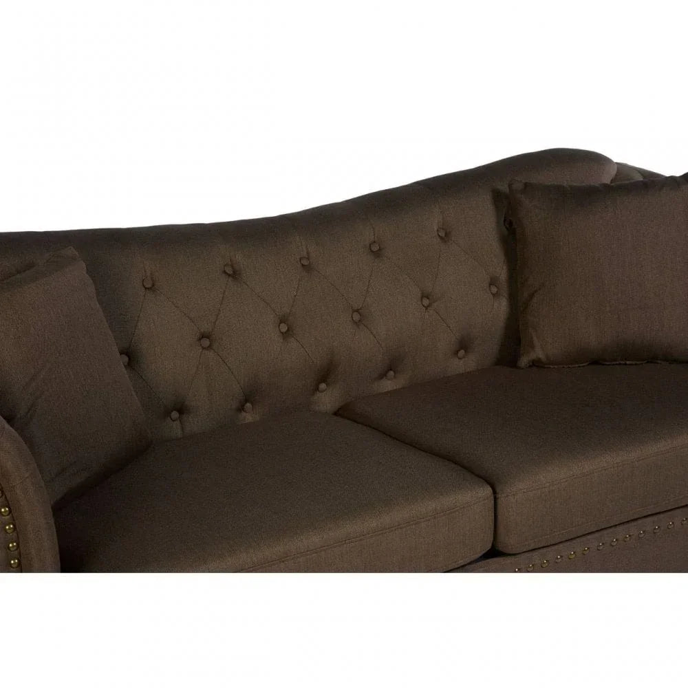 Brown fabric sofa with deep button-tufted backrest and brass stud detailing