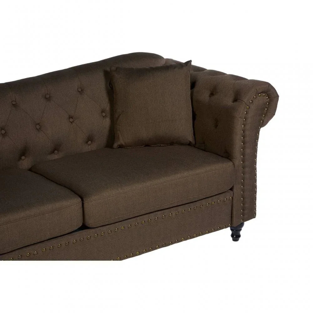 Brown fabric sofa with button-tufted back, nailhead trim and single cushion on arm