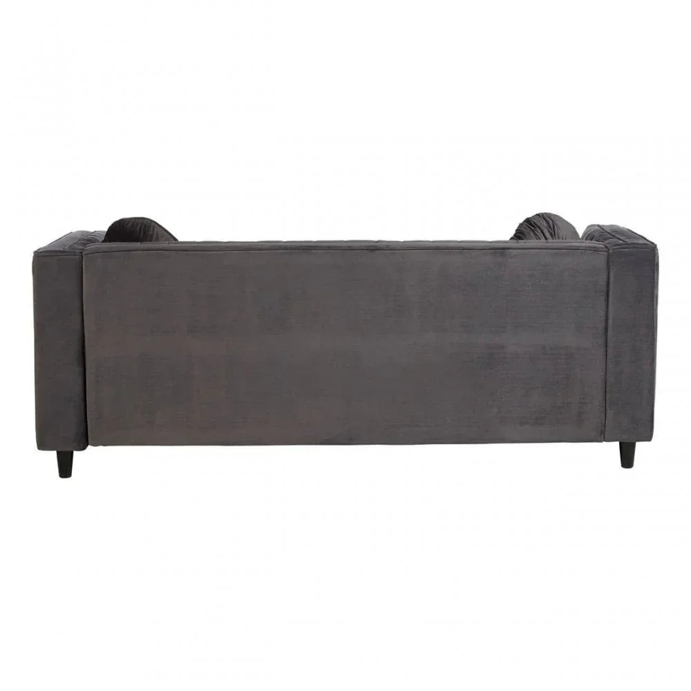 Back view of grey fabric sofa with square arms and short black legs