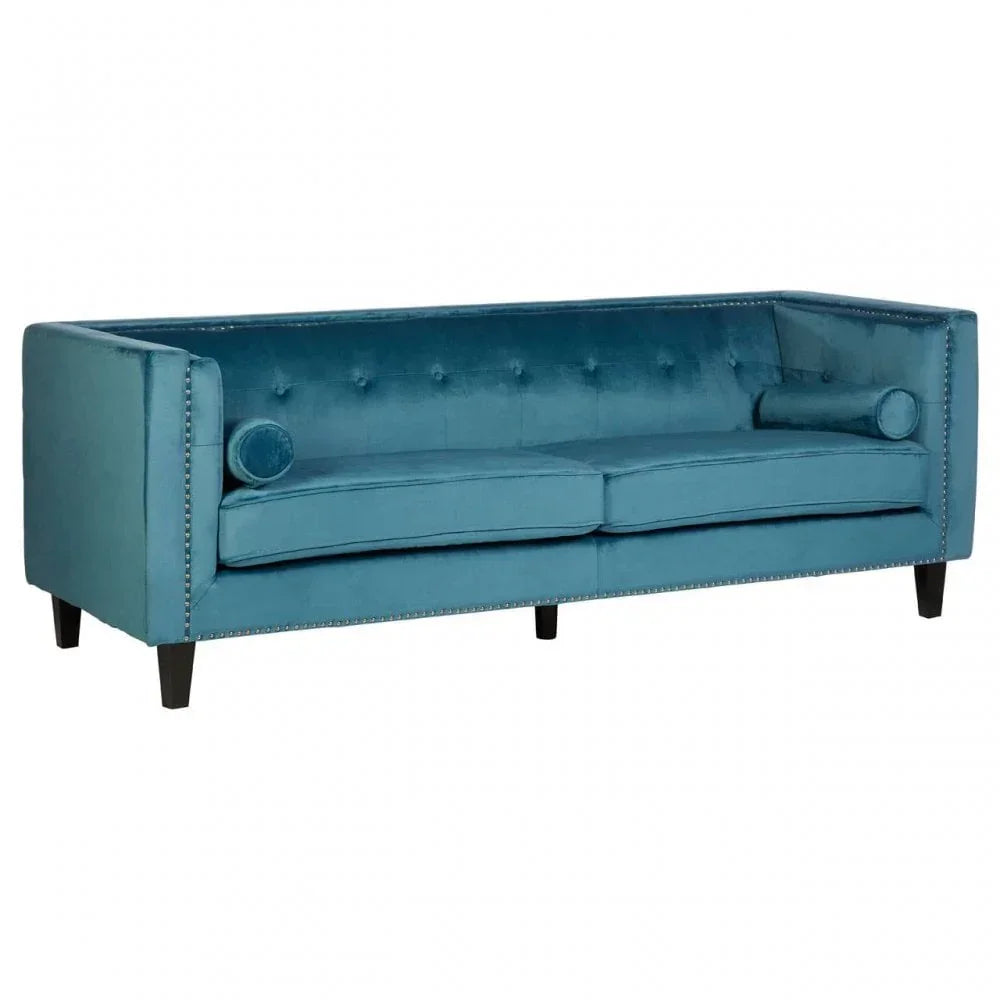 Blue velvet sofa with button-tufted back, straight arms, and nailhead trim