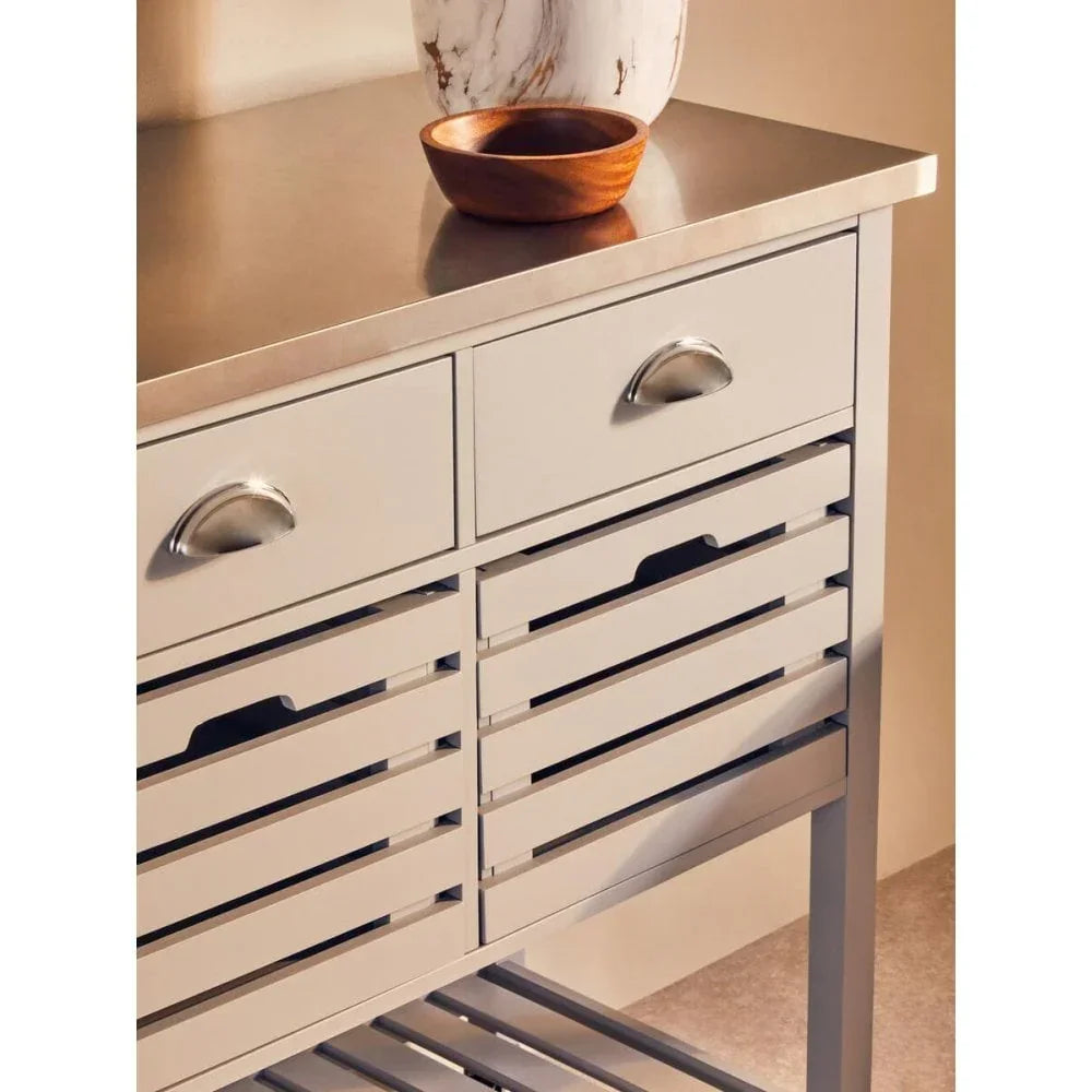 Cream kitchen storage unit with stainless steel top, two drawers and slatted shelves