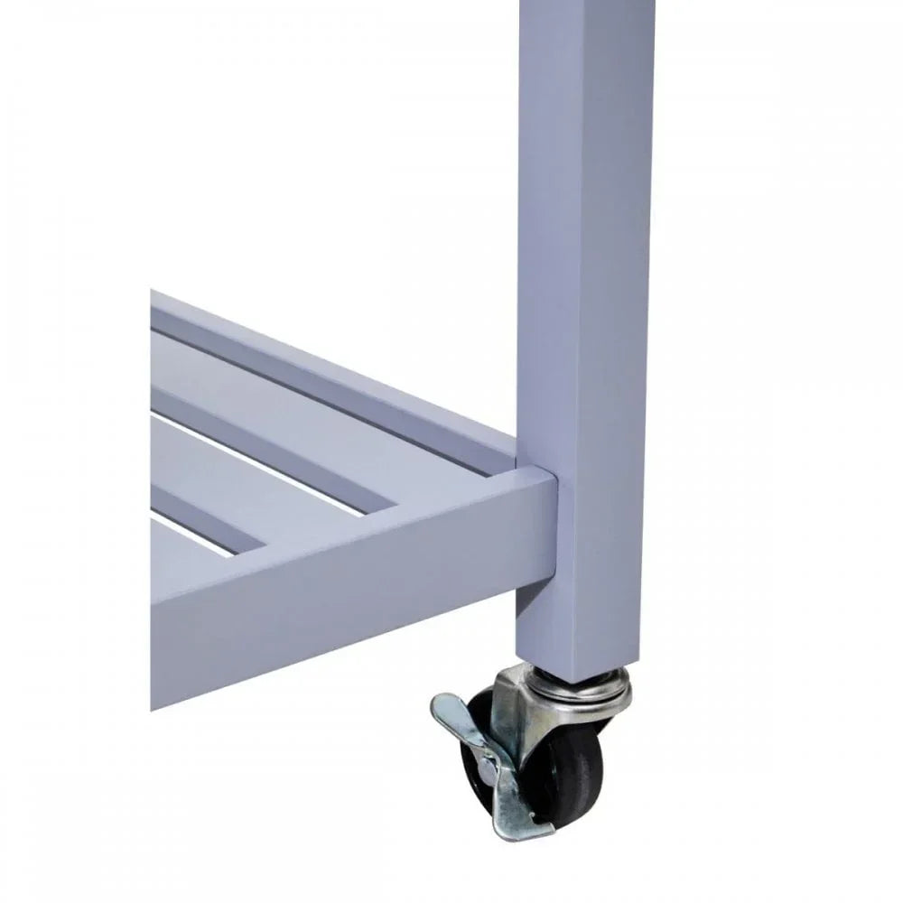 Closeup of metal furniture leg with caster wheel and slatted shelf