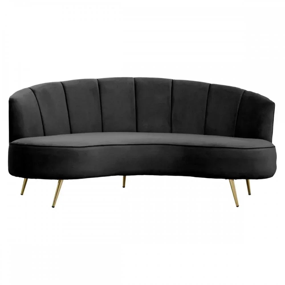 Black velvet sofa with curved backrest and gold metal legs