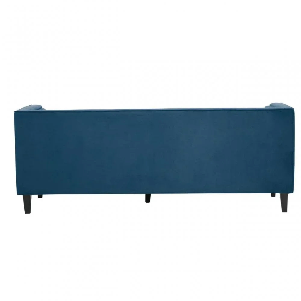 Back view of blue velvet sofa with wooden legs