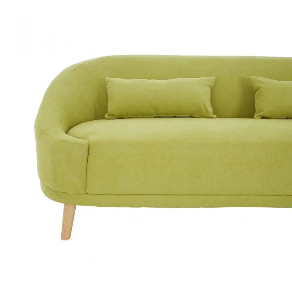 Green fabric sofa with curved armrest and two matching cushions, wooden leg detail visible