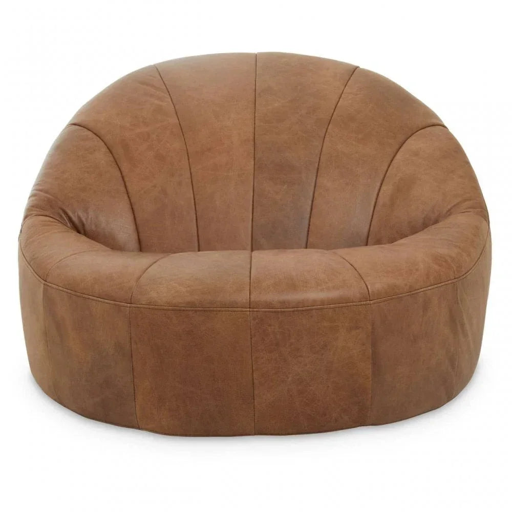 Brown leather accent chair with rounded back and plush seat, front view