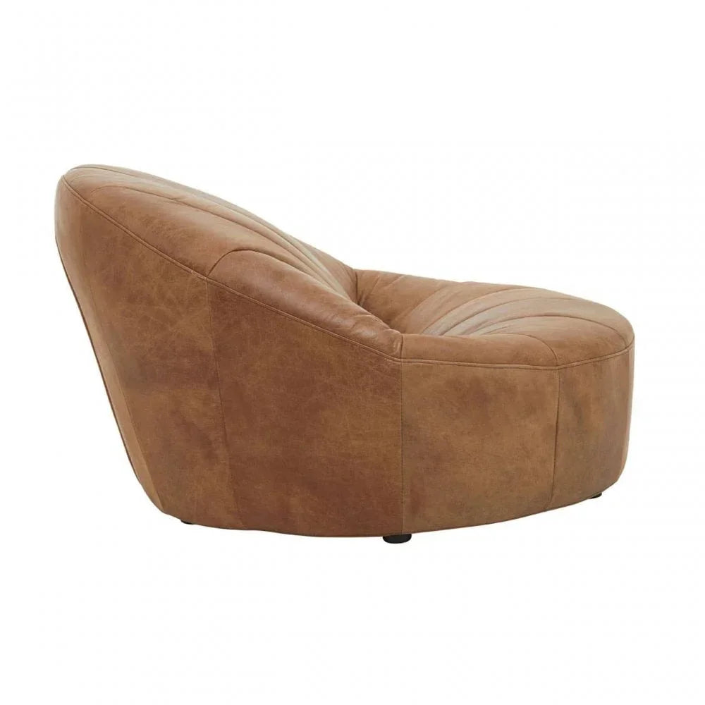 Brown leather accent chair with curved backrest and tufted seat, side angle view