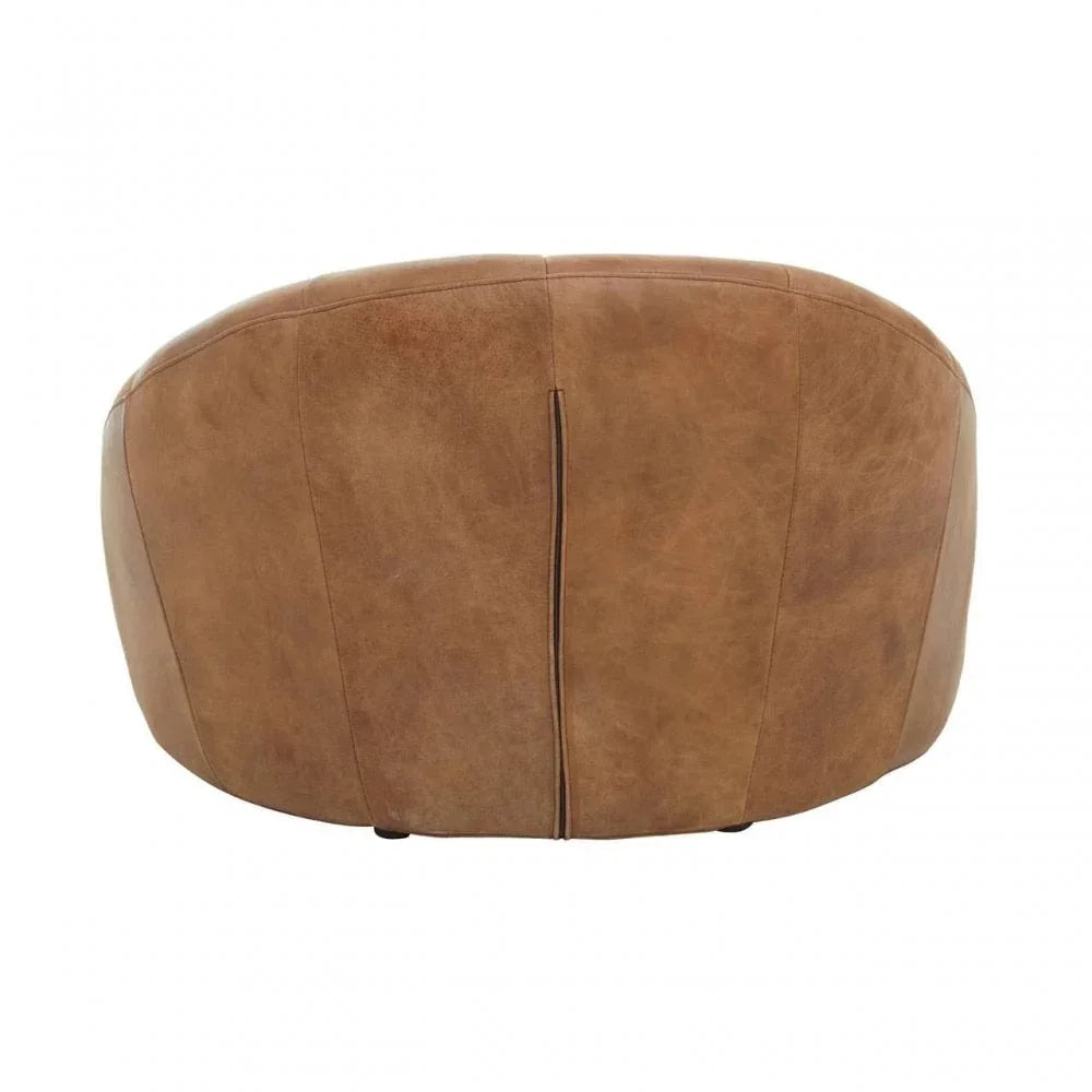 Rear view of brown leather armchair with curved backrest and visible stitching detail
