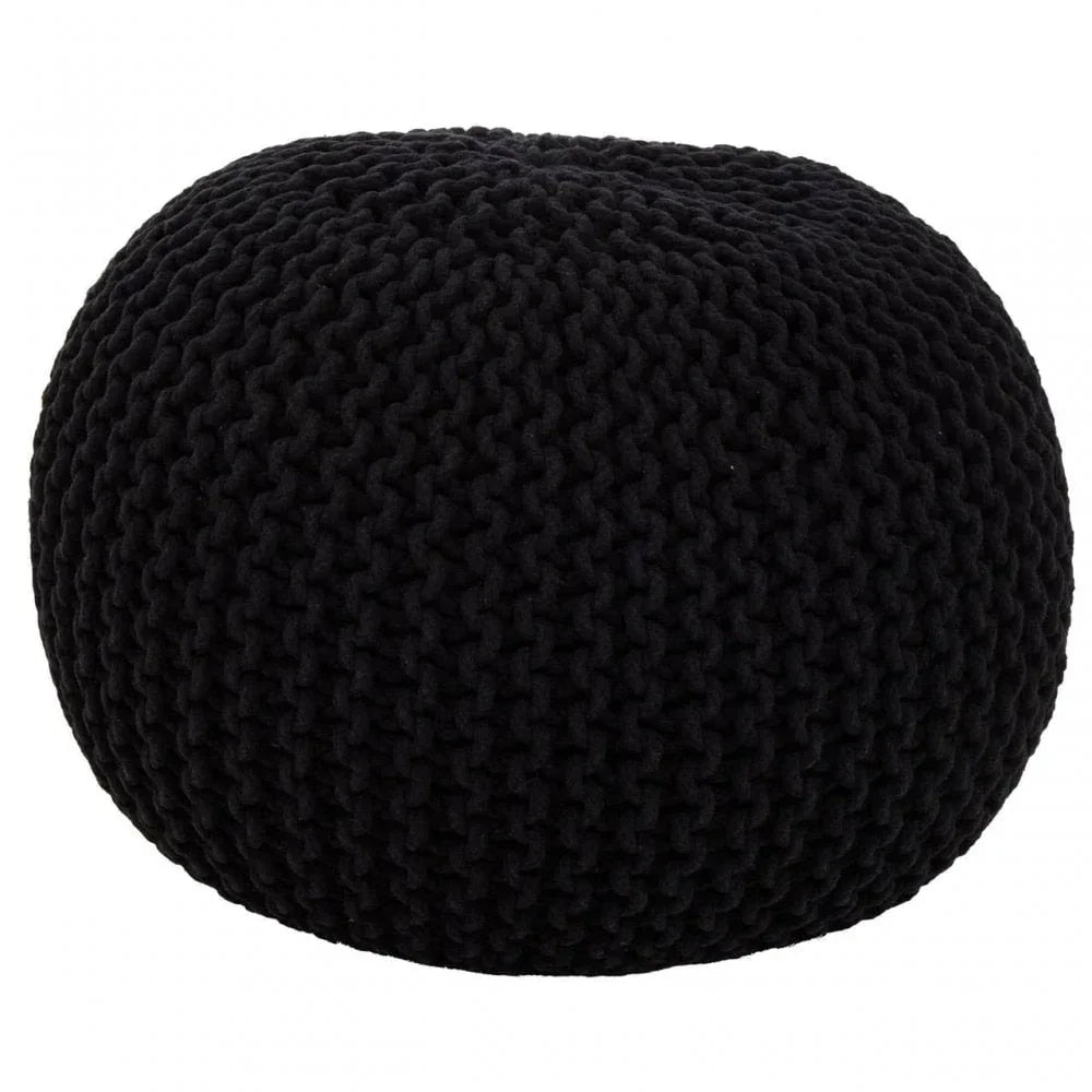 Black knitted pouffe footstool with chunky textured pattern on white background