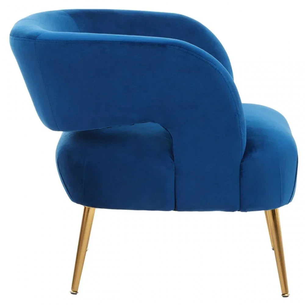 Blue velvet accent chair with gold metal legs, side view