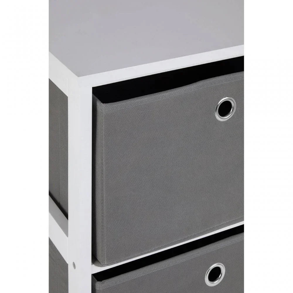 White storage unit with grey fabric drawers and metal handle grommets, close up view