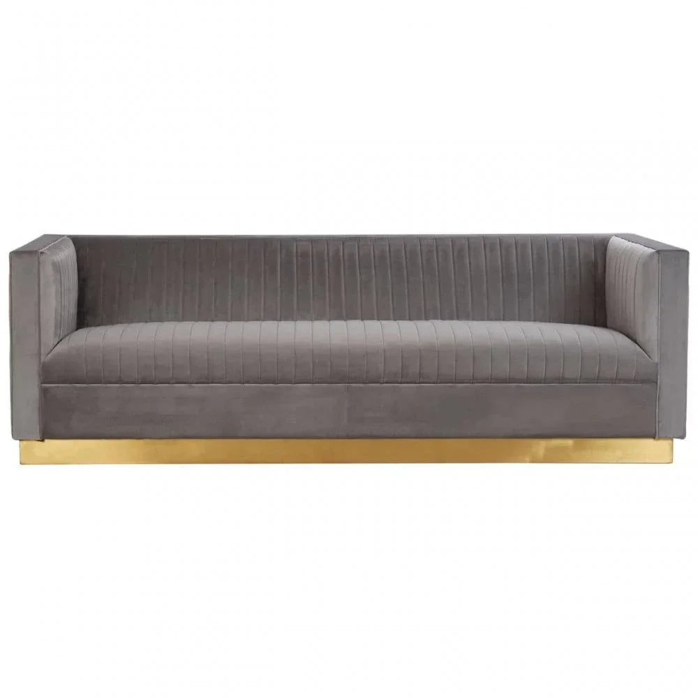 Grey velvet sofa with gold base, vertical stitched back and seat, front view
