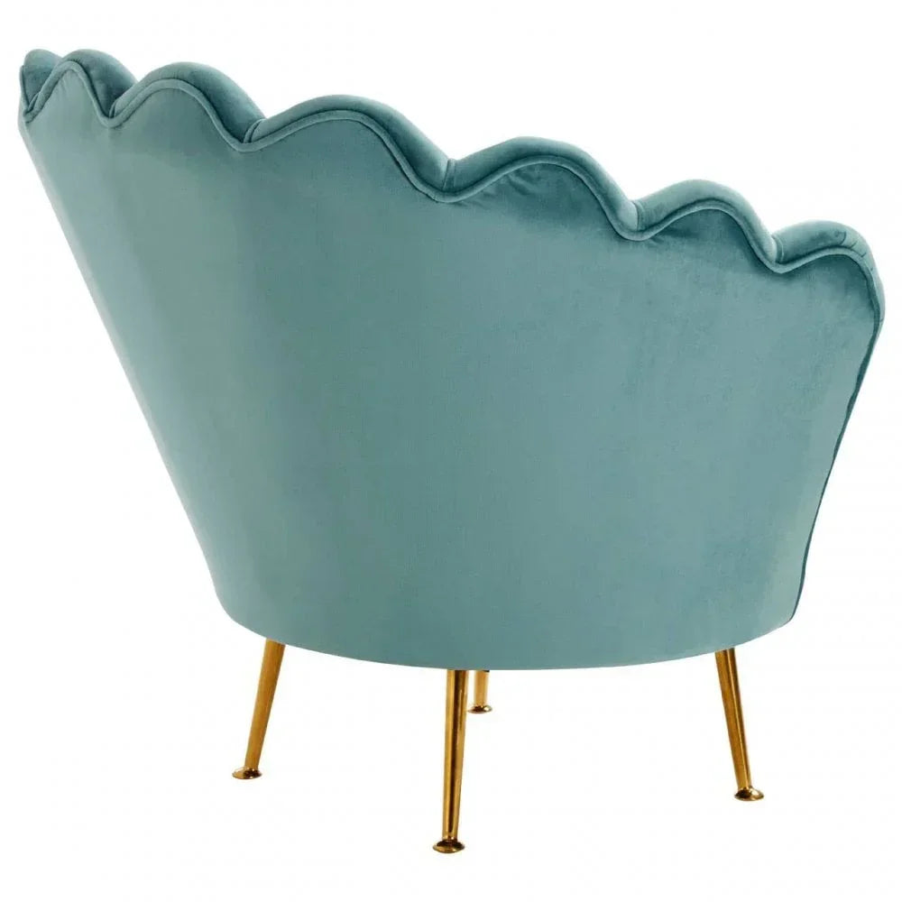 Teal velvet accent chair with scalloped back and gold metal legs, rear view