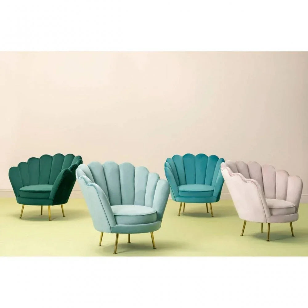 Velvet scallop armchairs in teal, mint, aqua, and blush on gold legs grouped in room