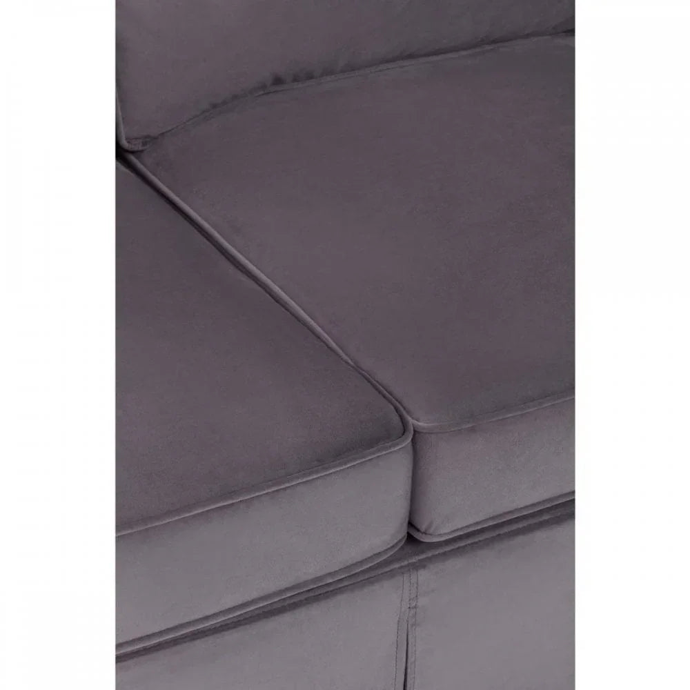 Close-up of grey fabric sofa seat cushions with visible seam detail