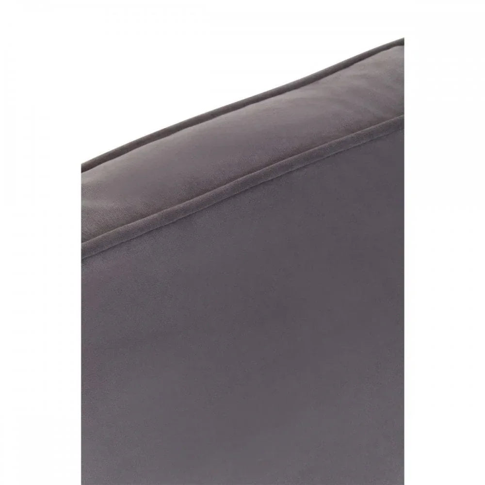 Close-up of grey fabric sofa cushion with visible stitching detail