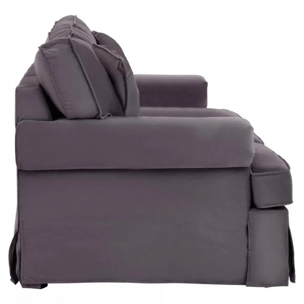 Side view of grey fabric sofa with plush back cushions and armrest