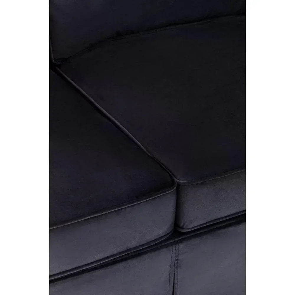 Close-up of black fabric sofa cushions with visible seam detail