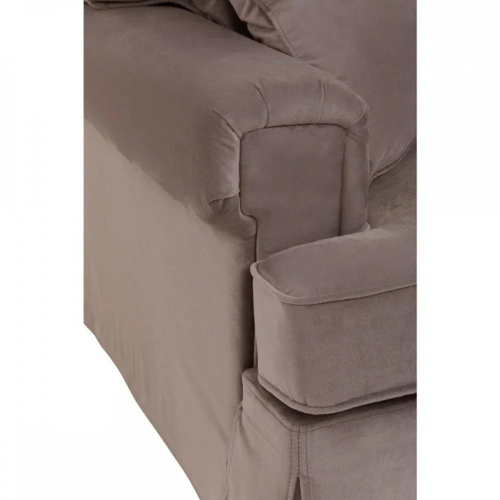 Corner view of a grey fabric sofa arm with matching cushion and seat detail
