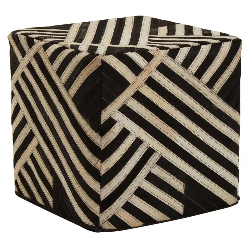 Black and cream striped cube pouffe with geometric pattern upholstery