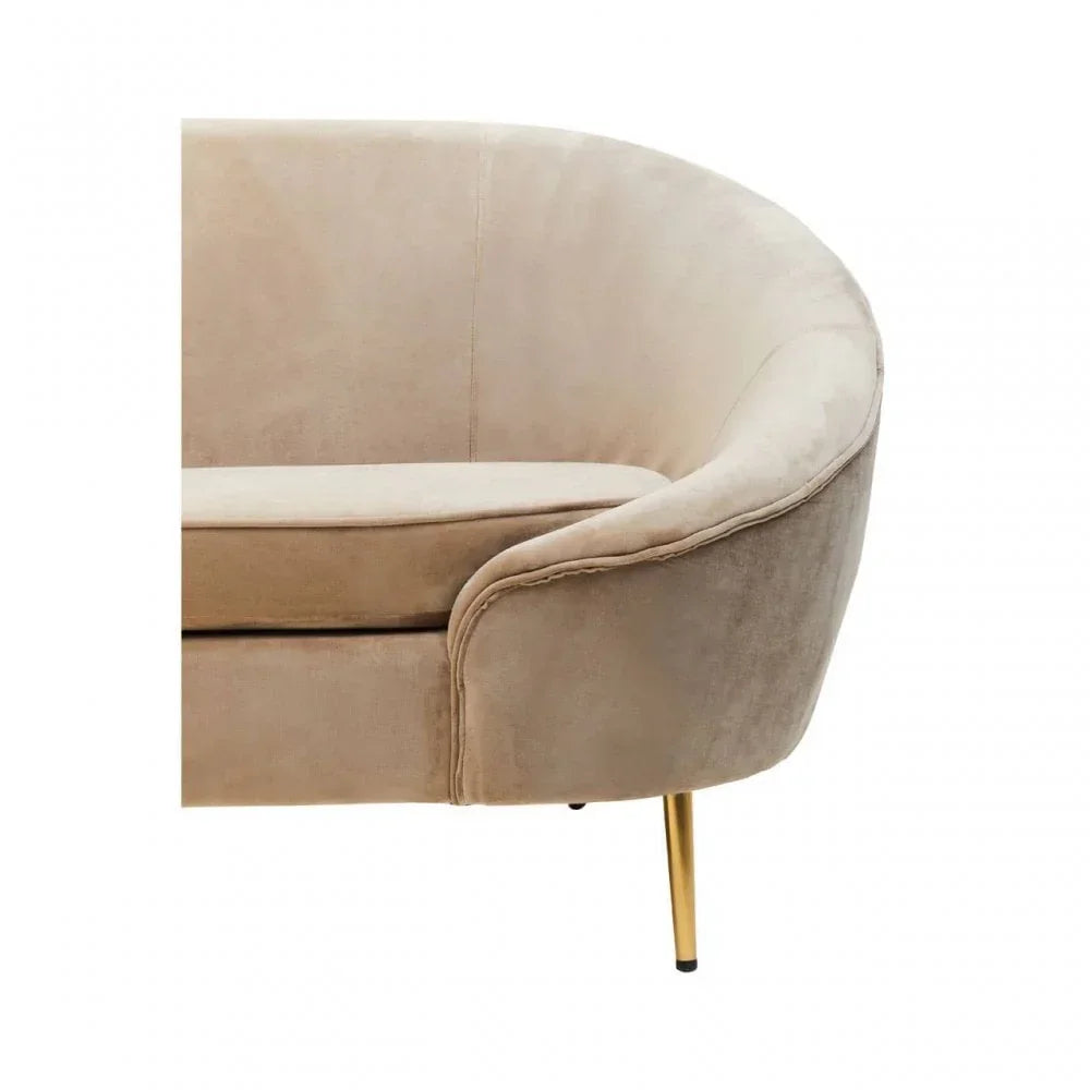 Beige velvet sofa corner with rounded armrest and gold metal leg