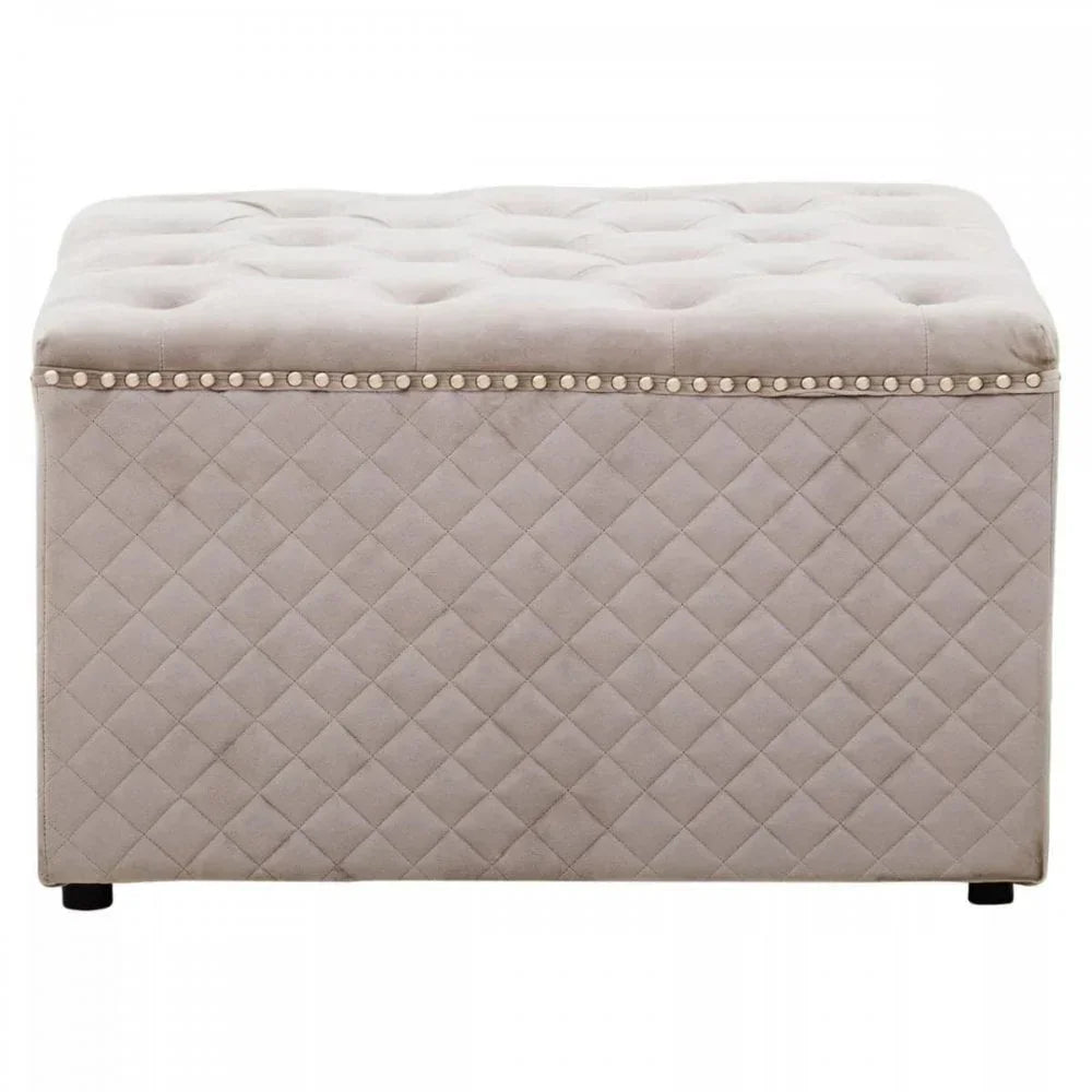 Beige upholstered storage ottoman with diamond quilted sides and tufted seat