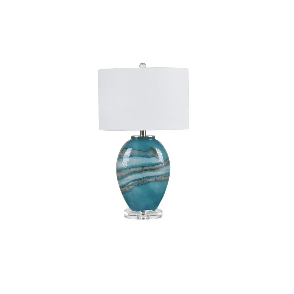 Teal ceramic table lamp with marble effect base and white drum shade
