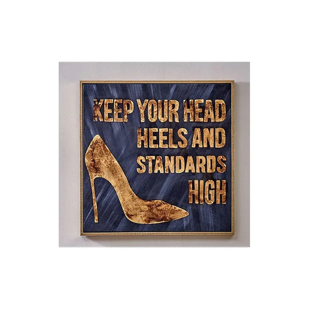 Gold high heel shoe wall art with 'Keep Your Head Heels and Standards High' text on navy background