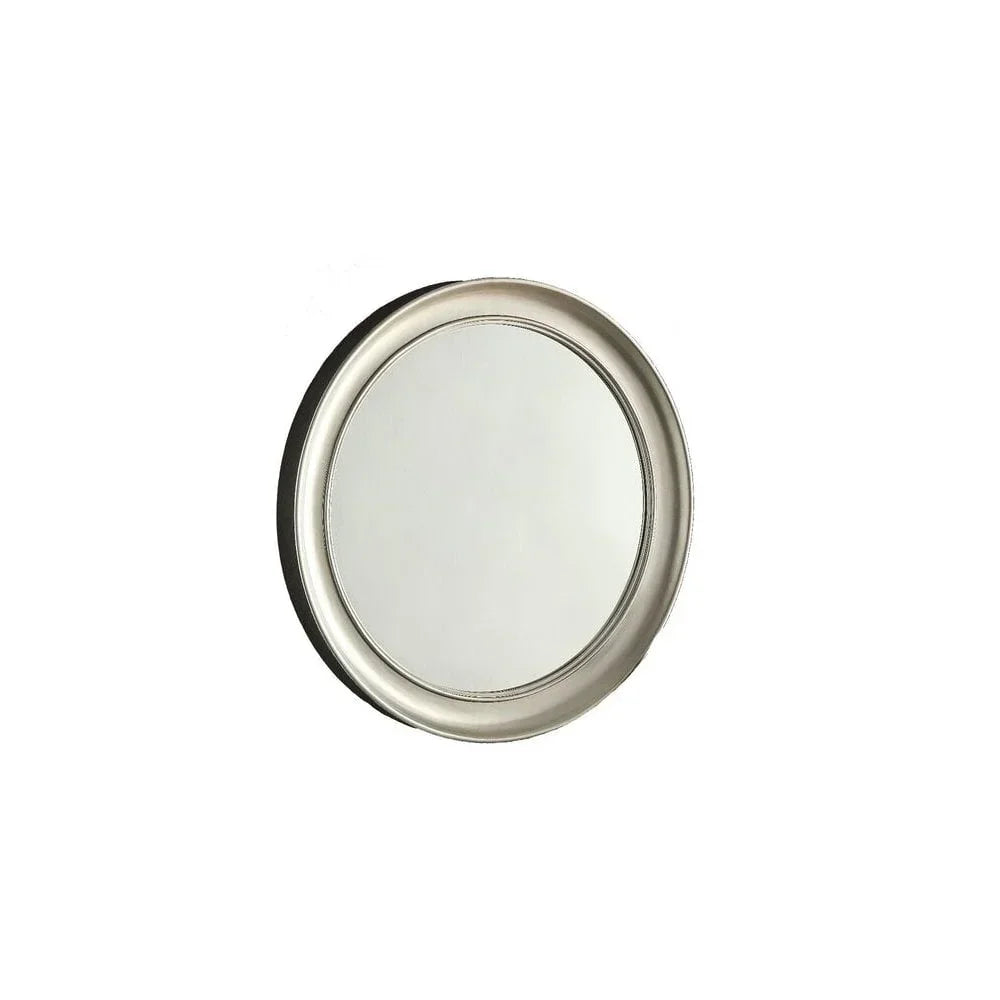 Round wall mirror with silver metallic frame on plain white background
