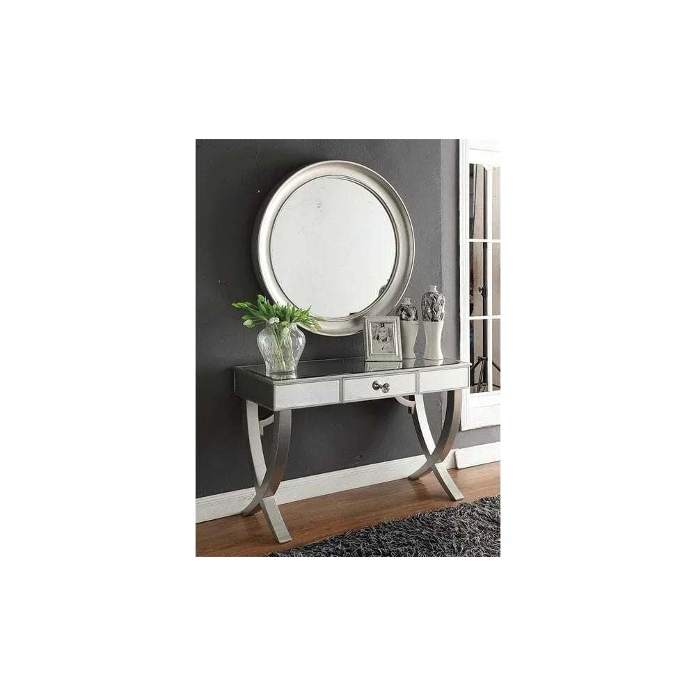 Mirrored console table with two drawers and round wall mirror in modern hallway setting