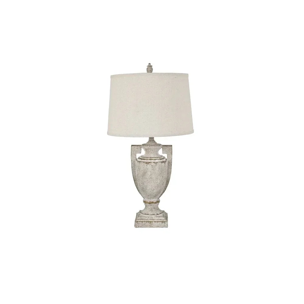 Stone effect table lamp with urn-shaped base and cream fabric lampshade