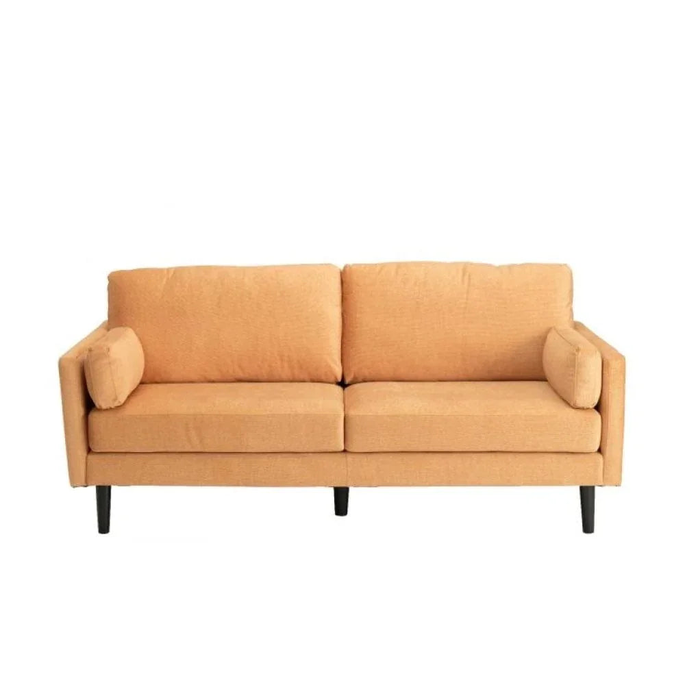 Mustard yellow fabric sofa with two seat cushions, two back cushions, and bolster pillows