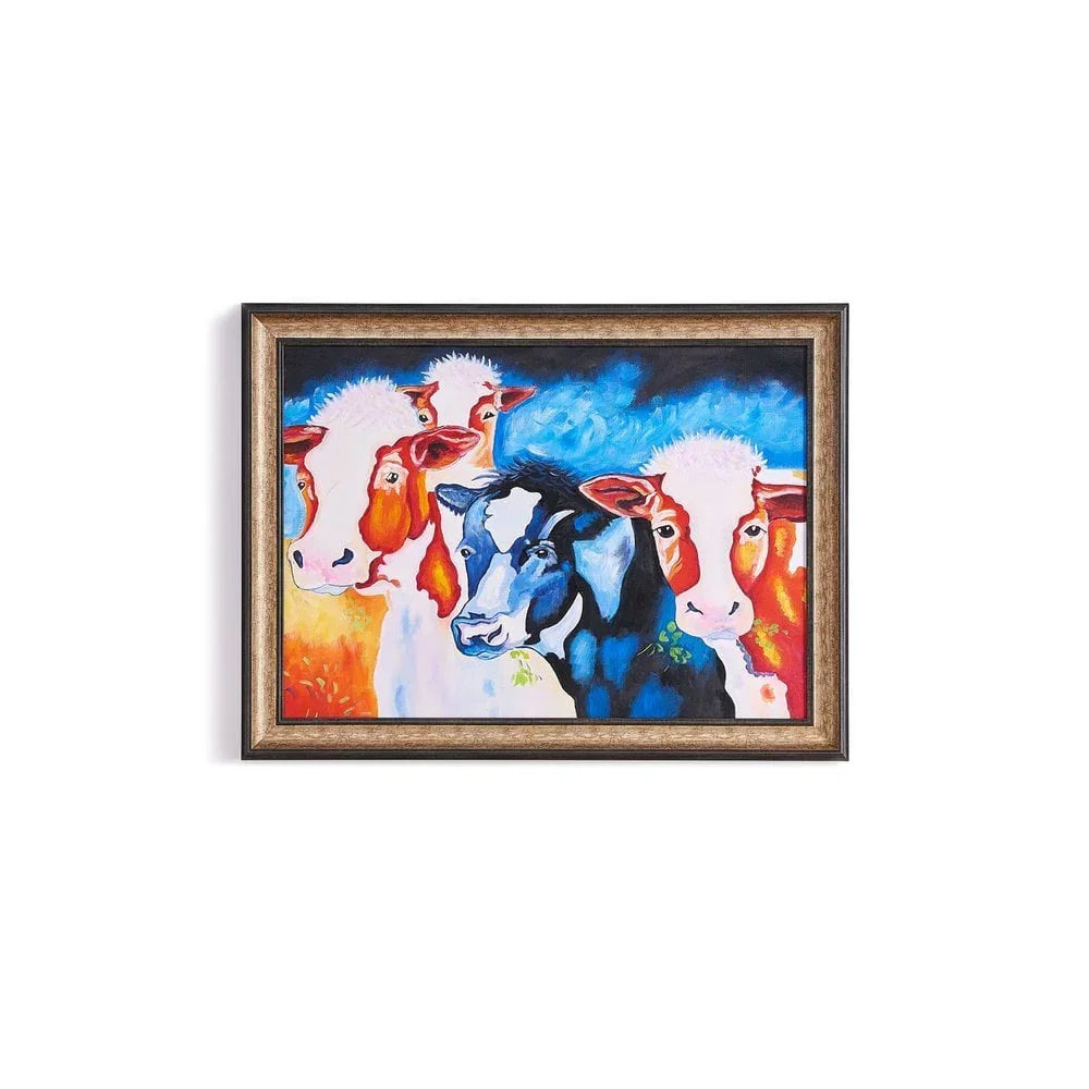 Framed wall art featuring colorful cow painting with blue, orange and white tones