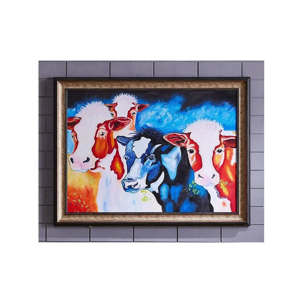 framed wall art with colorful cow painting on grey tiled background