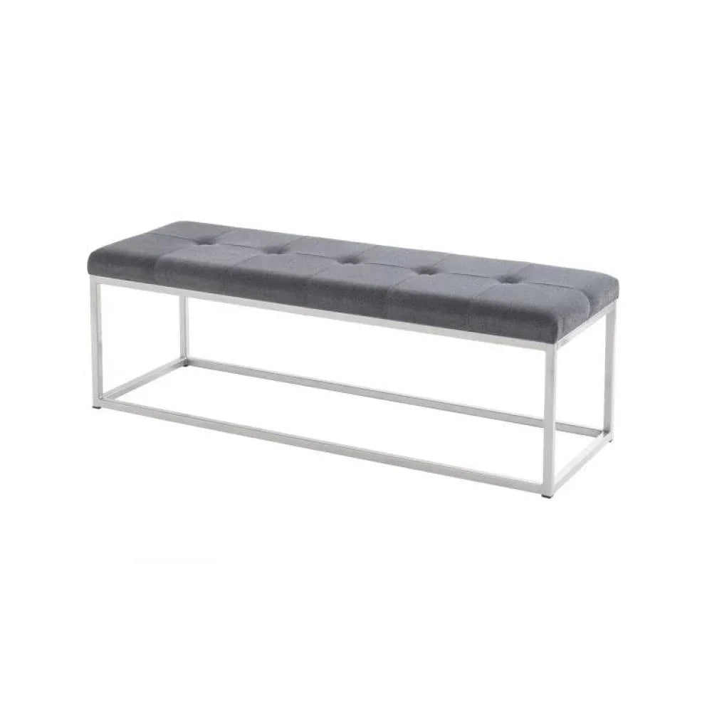 Grey upholstered bench with tufted seat and metal frame