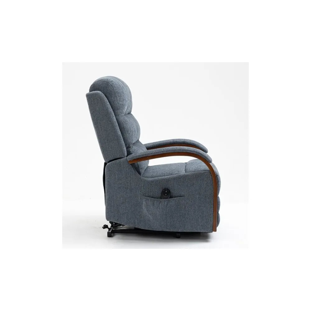 Side view of grey fabric recliner chair with wooden armrests on white background