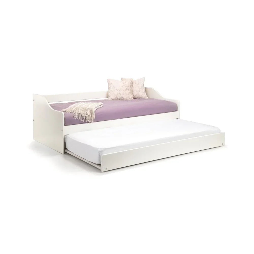 White wooden day bed with pull-out trundle and lilac bedding, angled front view
