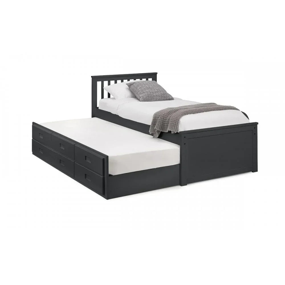 Black wooden trundle bed with pull-out guest bed and storage drawers