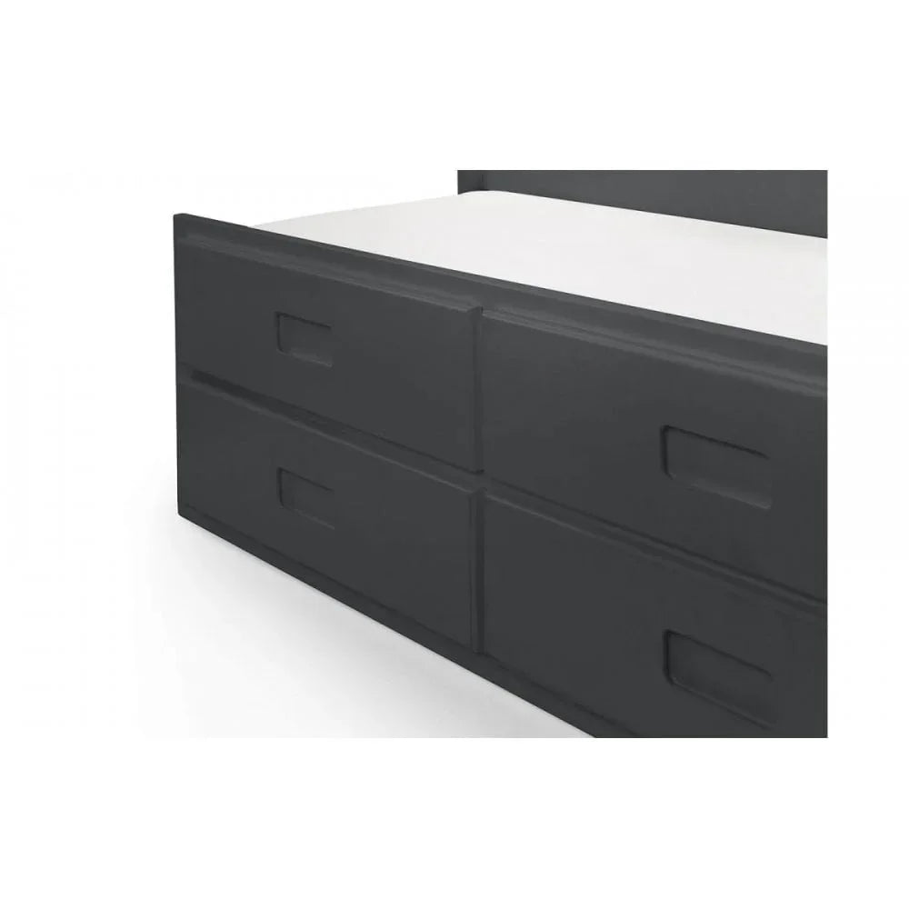 Dark grey storage bed with four drawers and recessed handles, partial side view