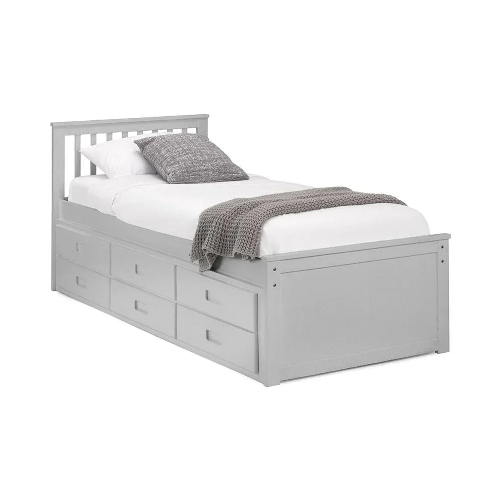 Grey single storage bed with slatted headboard and six drawers, styled with bedding