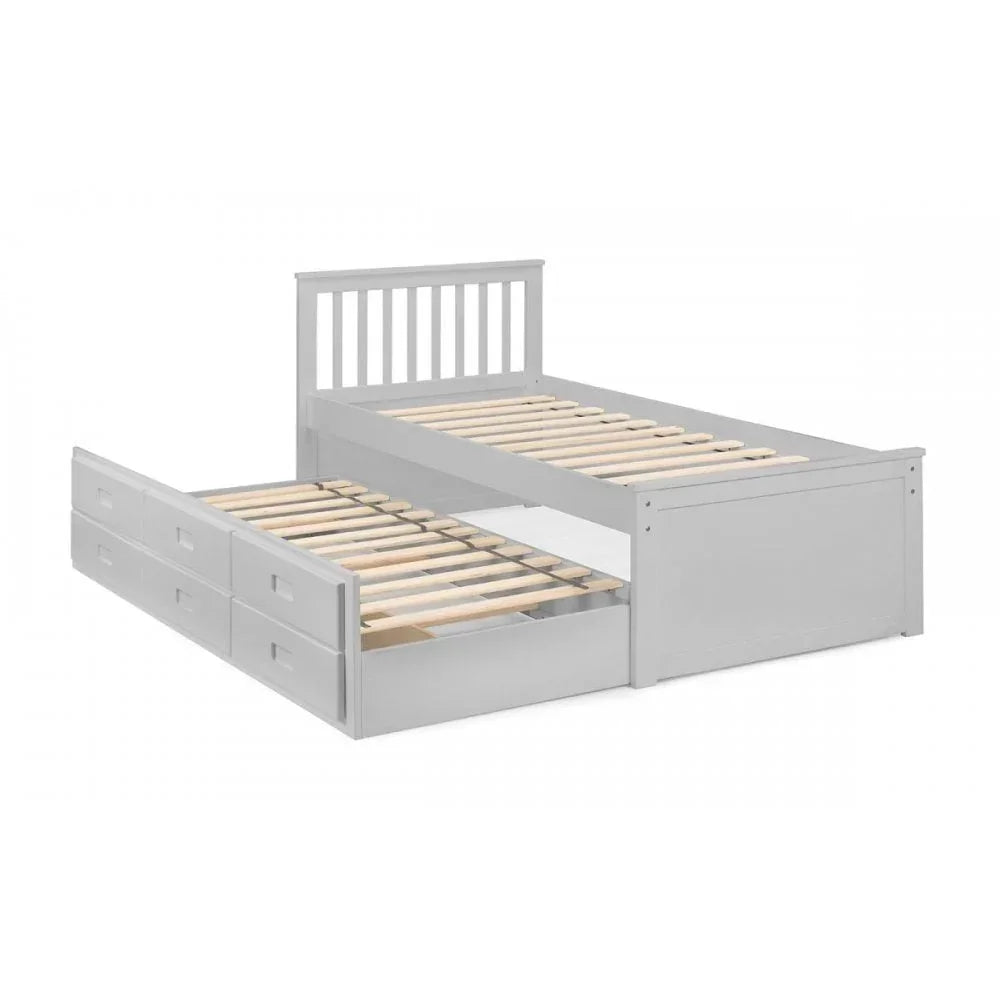 Grey wooden guest bed with pull-out trundle and slatted base, side angle view