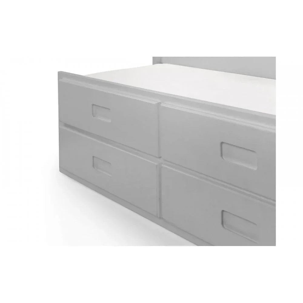 White wooden bed frame with four built-in storage drawers, close side view