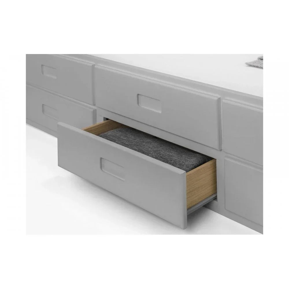 Grey storage bed with open drawer showing built-in underbed storage compartment