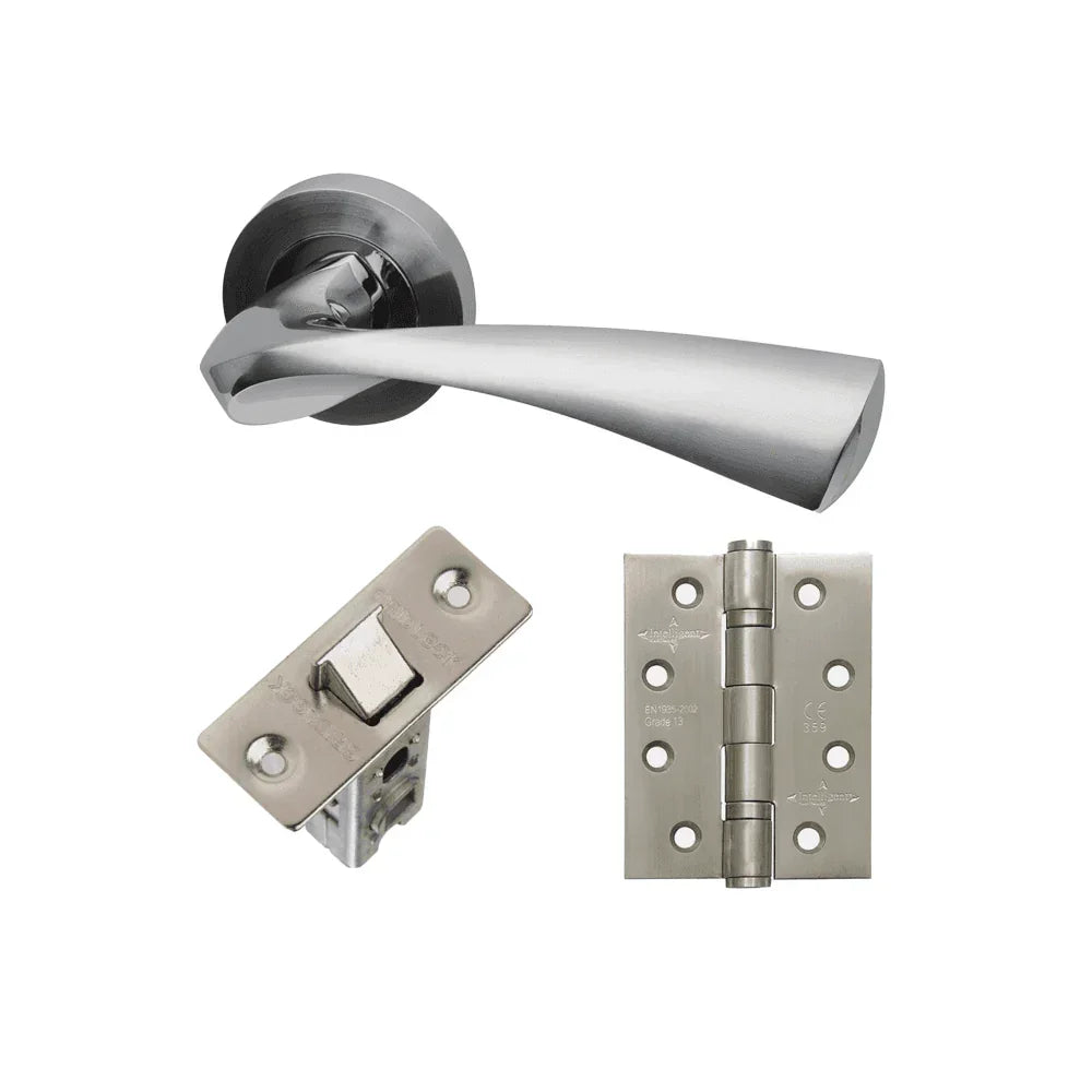 Brushed chrome door handle set with latch and matching hinge on white background