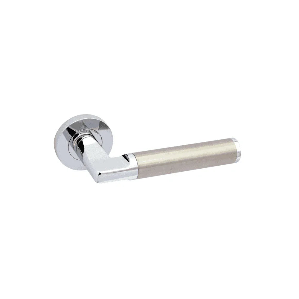 chrome and brushed nickel door handle with round rose on white background
