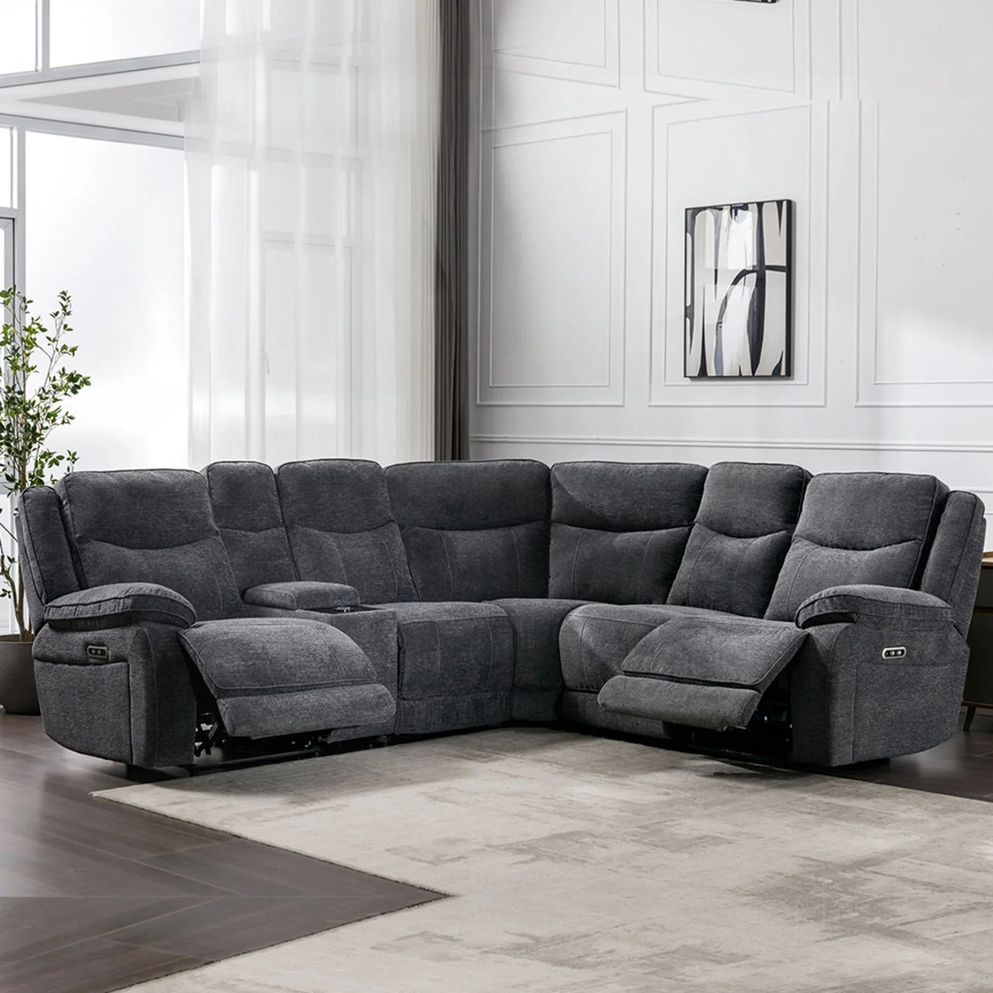 Dark grey electric corner sofa with recliners in modern living room setting