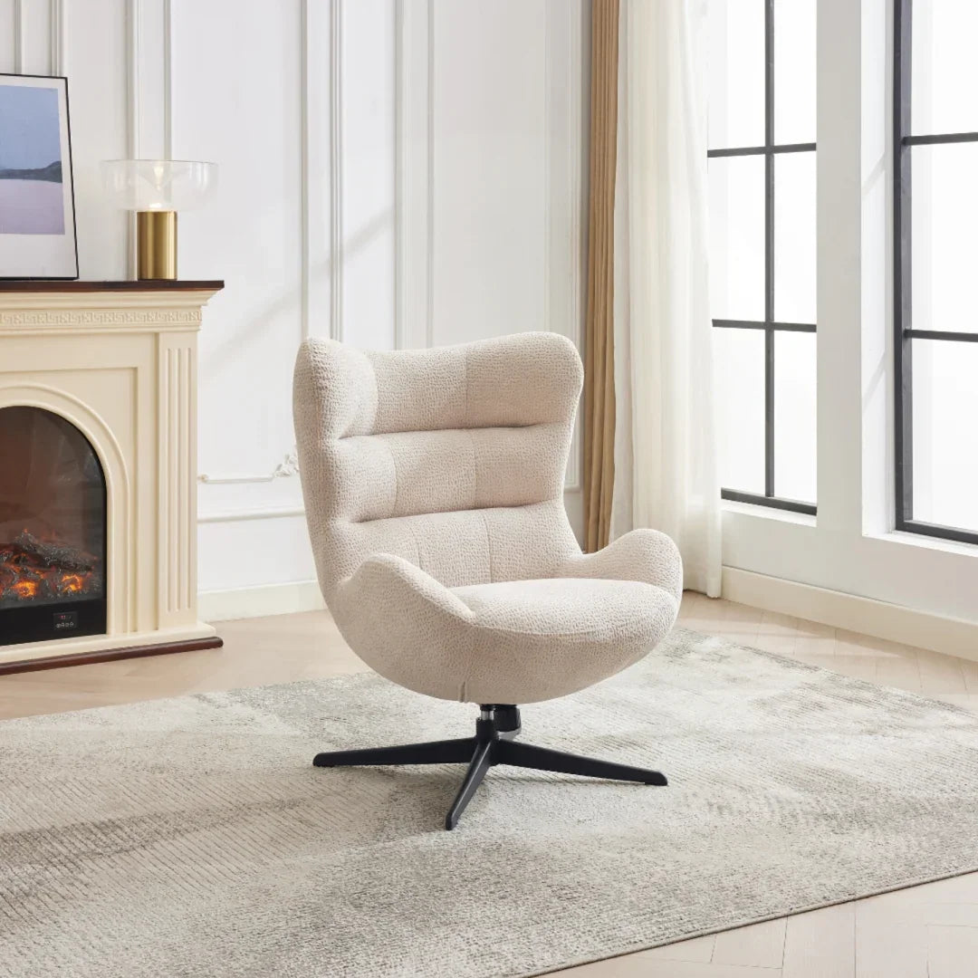 Linen swivel chair with black base in modern living room by fireplace and window